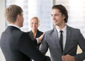 Two men shaking hands.